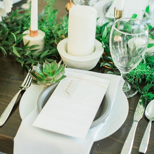Modern greenery wedding tablescape with gold menu