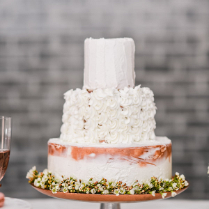 Copper and white wedding cake