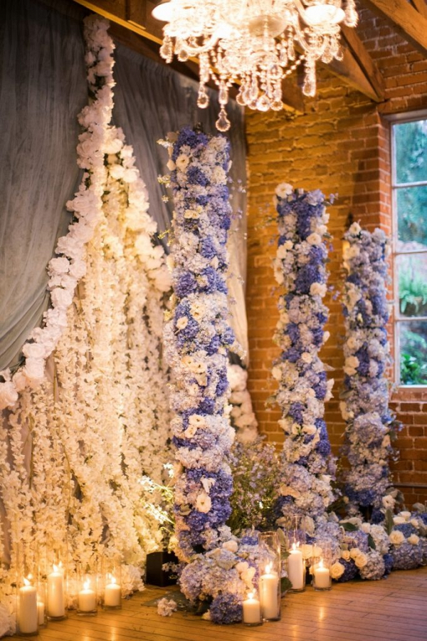 Floral draping and column ceremony backdrop