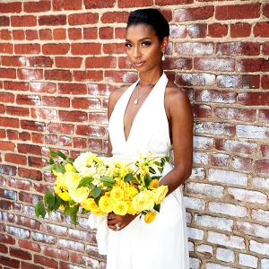 Lemonade Yellow Bouquet with Bride in White Jumpsuit