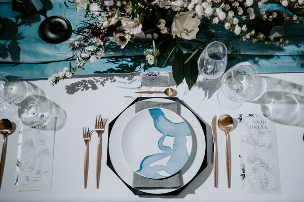 Modern blue and gold place setting