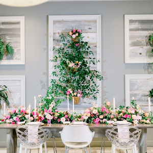 Romantic pink floral covered wedding table