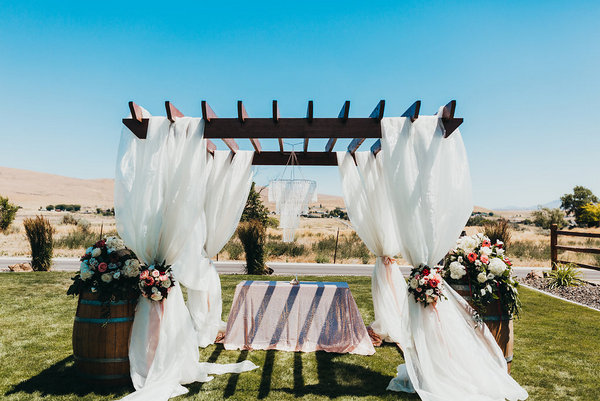 This Arbor Provides the Perfect Dramatic Backdrop for A Ceremony