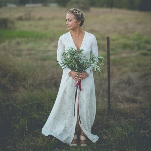 A boho Stone Cold Fox dress and handpicked bouquet