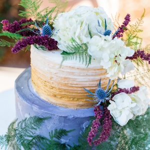 A Wild Winter Cake with Greenery and Flowers