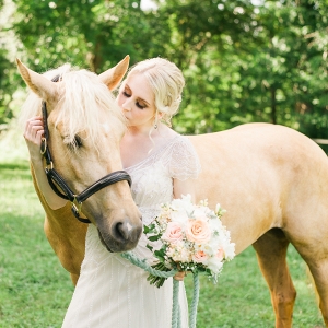 Bride Wearing Maggie Sottero Dress with Her Horse