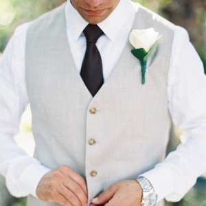 Groom Wearing Vest and Tie