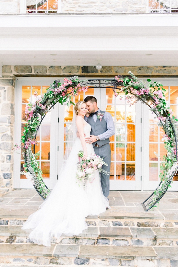 Round floral ceremony backdrop