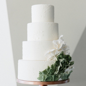 Modern white and green wedding cake