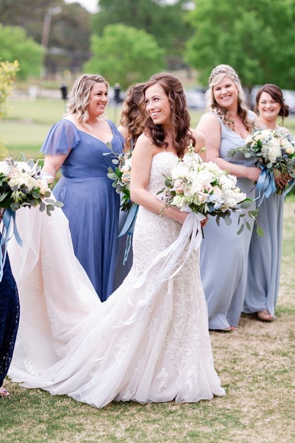 Bridesmaids in shades of blue dresses