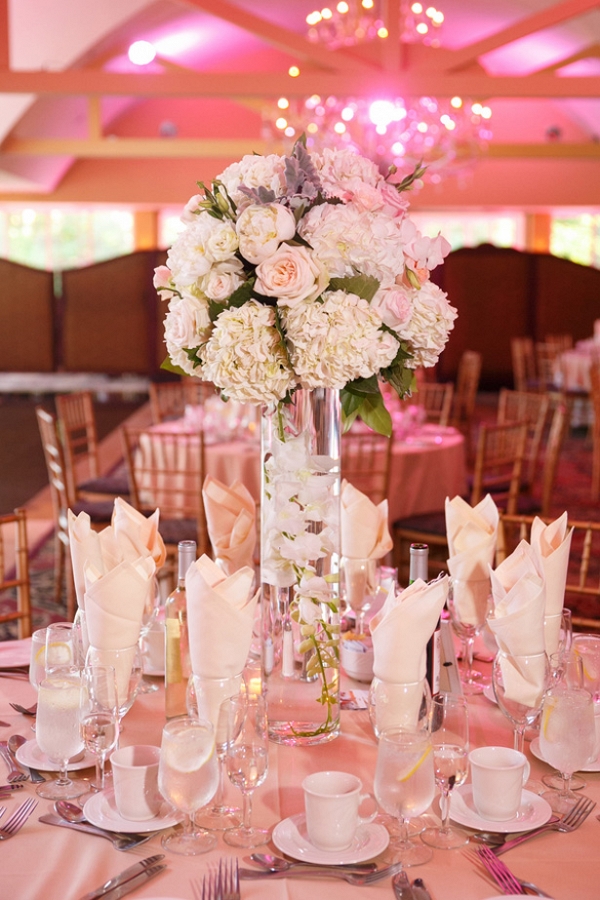 tall white and pink centerpiece on Belle the Magazine