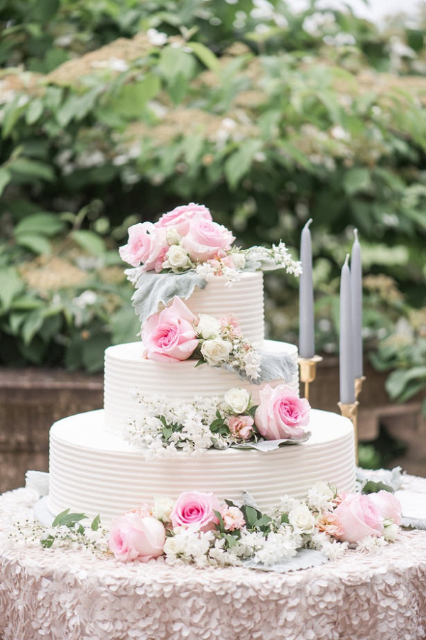 Buttercream wedding cake with pink roses