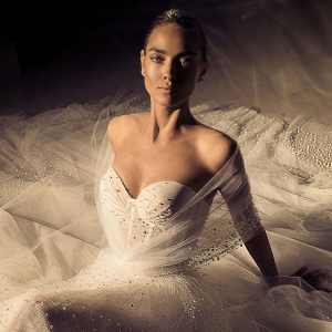 Glam embellished wedding dress with tulle off the shoulder overlay
