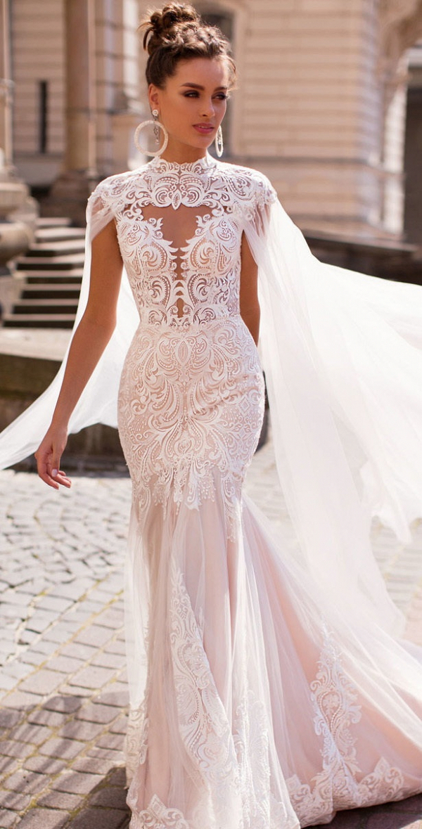 Lace wedding dress with bridal cape