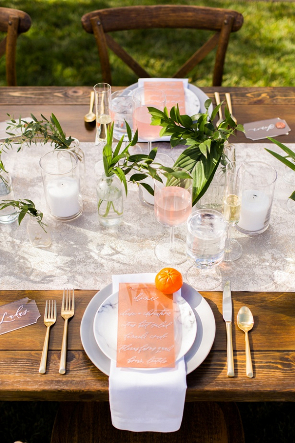 Modern orange wedding tablescape