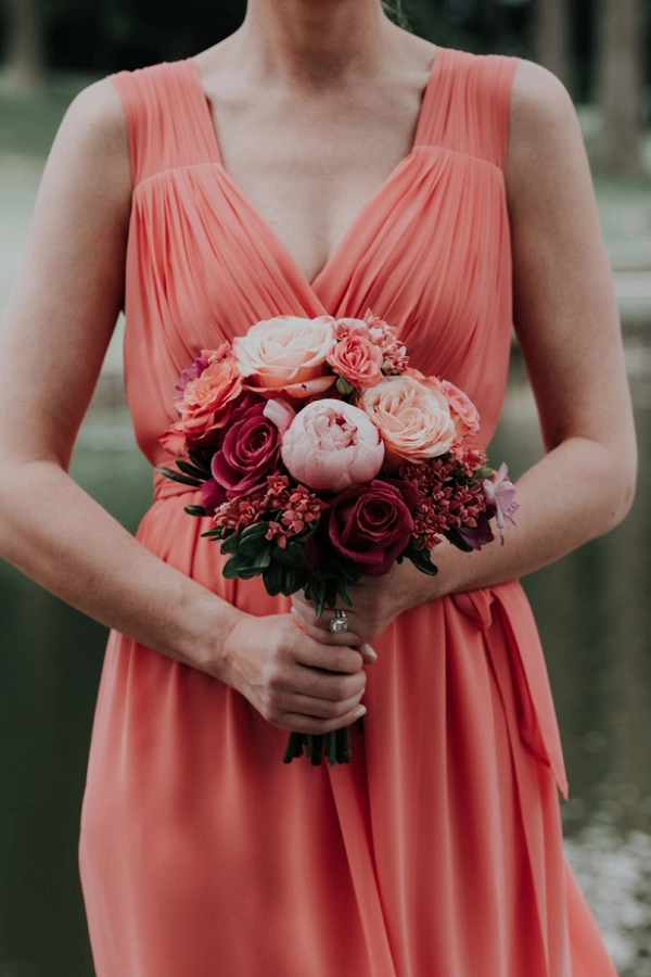 Coral bridesmaid dress and bouquet