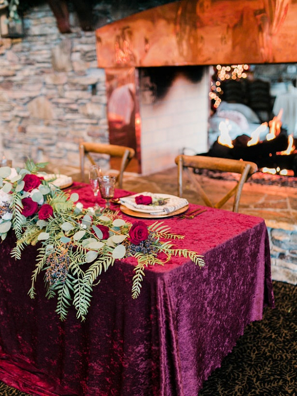 Sweetheart table by fireplace