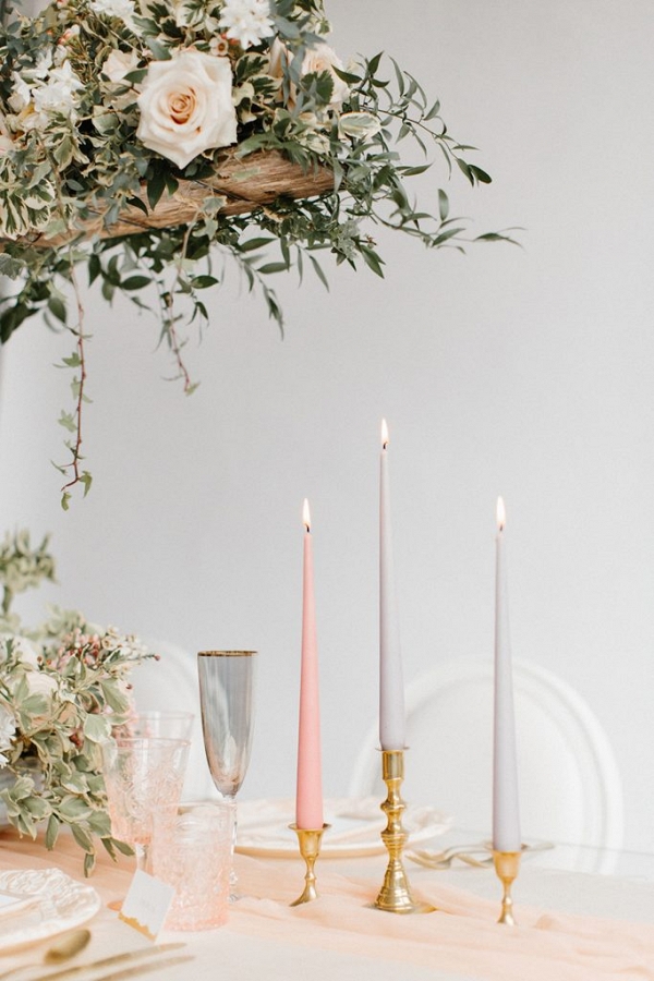 tablescape with silk runner, taper candles and pretty glassware