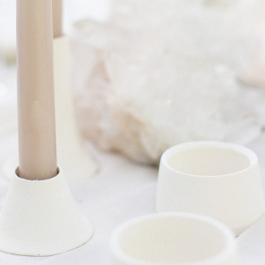 Modern candle holders and quartz clusters