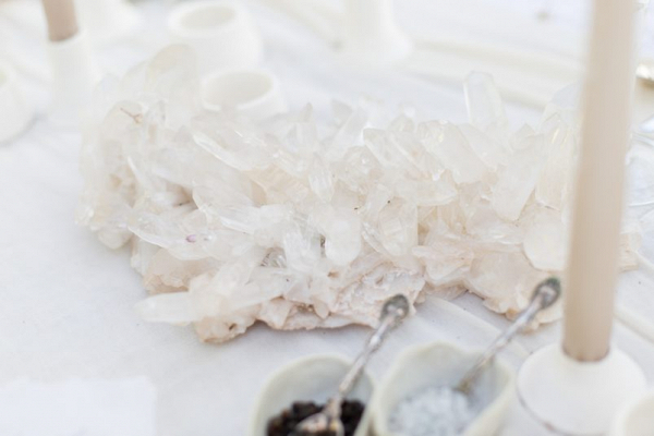 Huge quartz clusters decorate this wedding table setting