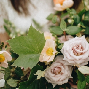 wedding bouquet with roses and foraged greenery