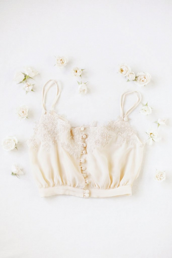 Beautiful silk bridal lingerie by Ailsa Munro, framed by cream roses!