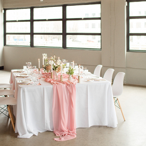 Pink and white modern wedding table setting