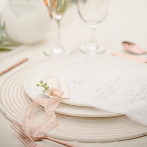 tablescape and place setting in peach and white