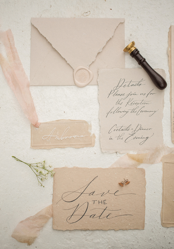 peach and white calligraphy stationery set with wax seals