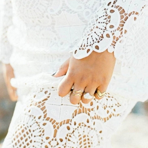 Details of the rings worn in this bohemian bridal look
