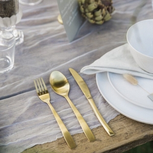 table setting and gold cutlery