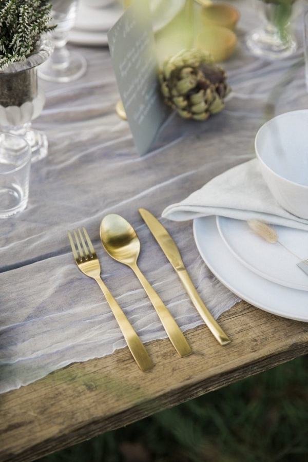 table setting and gold cutlery