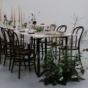 Creative table design with floor floral pieces
