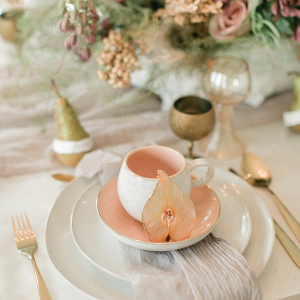 autumn wedding table decor and place setting with pear slices