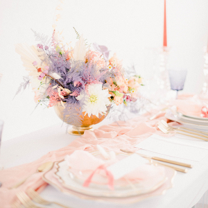 Pretty pink white and lilac wedding table decor