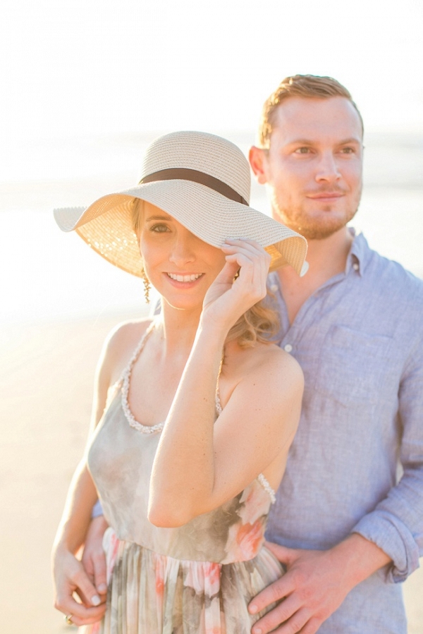 Romantic Beach Couple Shoot at Sunset with a Sun Hat