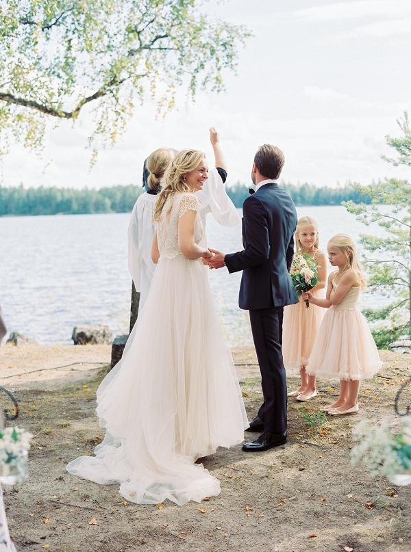 outdoor wedding ceremony by the lake