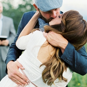 Relaxed Bride and Groom Vow Renewal First Kiss