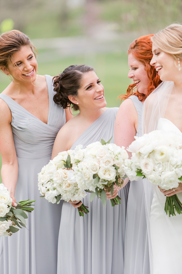 Lovely pale blue bridesmaids dresses with white bouquets!