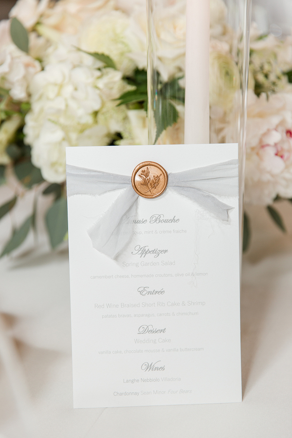 Elegant Menu design with pale blue ribbon and gold wax seal