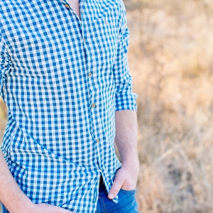 shirt and jeans details of oliver's engagement session outfit
