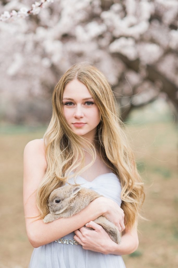 Bridal portrait ideas with blossom trees and bunny rabbits