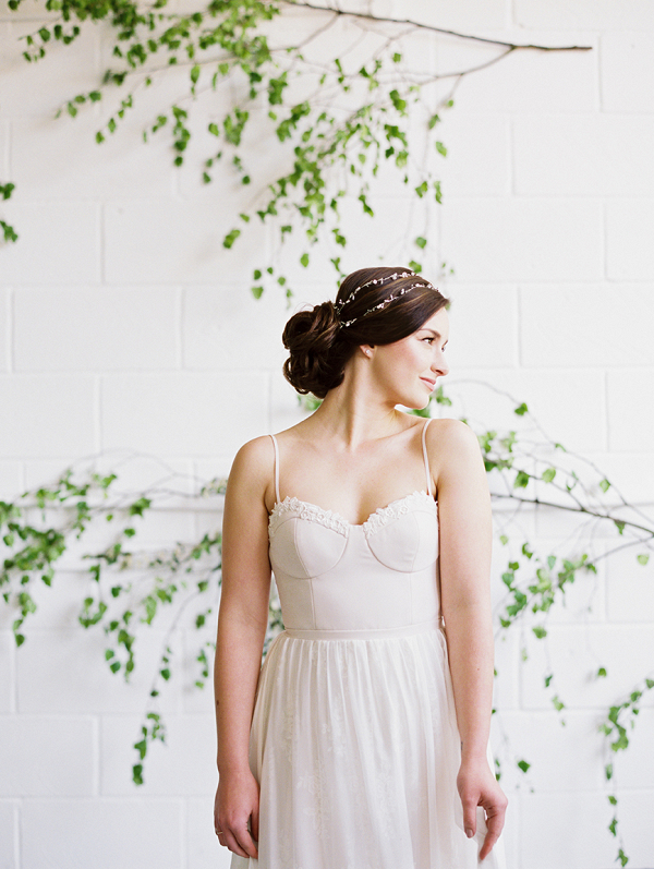 Modern bridal look for the Art of Styling workshop with foliage installation backdrop