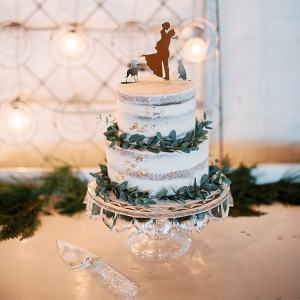Semi-naked two tier wedding cake with copper cake topper 