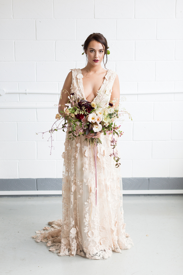 The beautiful wedding dress by Halfpenny London filled with embroidered flowers