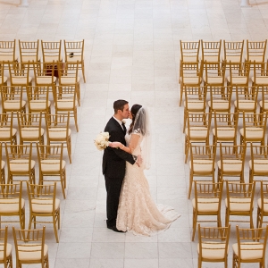 Chiavari Chairs Flank an Epic Wedding Ceremony Site at this Navy Blue & Gold Museum Wedding