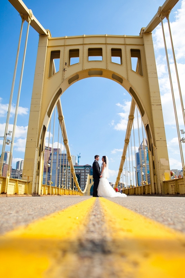 Bright Blue Sky White Puffy Clouds Iconic Bridge Happy Bride Groom Photo Romantic Totally Fun Pittsburgh Wedding