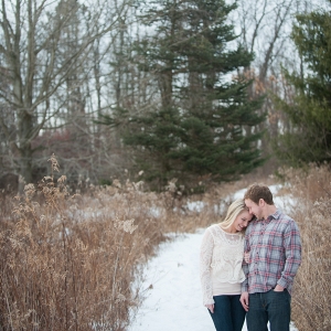 This Pair Looks Comfy and Cozy During Their Snowy Field Engagement Session
