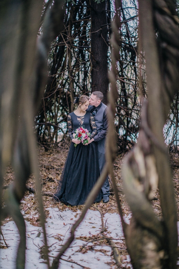 Twisted Dead Trees, Snow, and a Black Lace Dress were the Perfect Details for this Twisted Fairy Tale Engagement Session