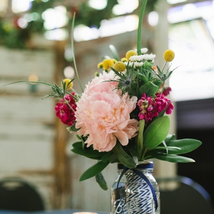Wildflower-Inspired Mason Jar Centerpieces Floral Garland Vintage Rentals Unique Setting Whimsical DIY Wedding